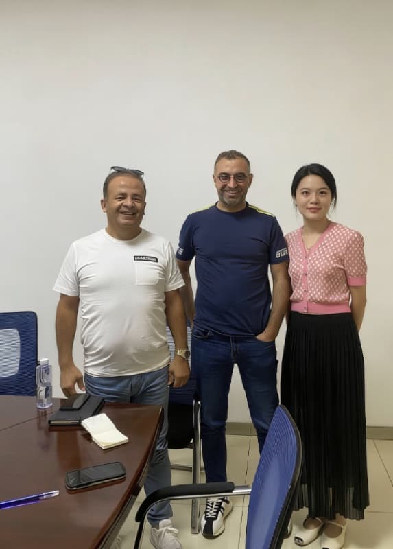 Middle Eastern clients visiting HojeeCarb office for business meeting